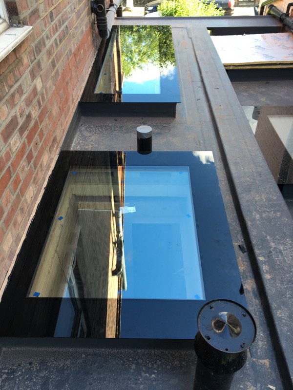 Multiple flat roof skylights on extension in Twickenham